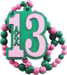 View Buying Options For The Alpha Kappa Alpha Wood Color Bead Tiki Line #13 Medallion